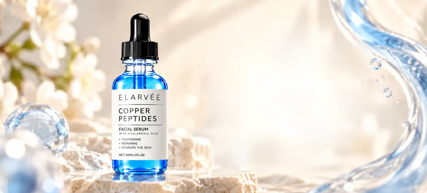 ELARVÉE Copper Peptides facial serum on a stone pedestal with white blossoms